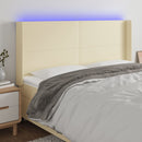 sengegavl med LED-lys 183x16x118/128 cm kunstlæder cremefarvet