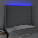 sengegavl med LED-lys 93x16x118/128 cm stof lysegrå