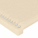 sengegavl med LED-lys 147x16x118/128 cm stof cremefarvet