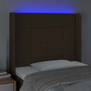 sengegavl med LED-lys 83x16x118/128 cm stof mørkebrun