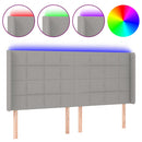 sengegavl med LED-lys 163x16x118/128 cm stof lysegrå
