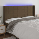 sengegavl med LED-lys 163x16x118/128 cm stof mørkebrun