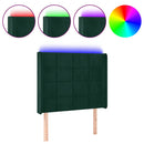sengegavl med LED-lys 83x16x118/128 cm fløjl mørkegrøn