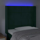 sengegavl med LED-lys 103x16x118/128 cm fløjl mørkegrøn