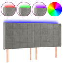 sengegavl med LED-lys 163x16x118/128 cm fløjl lysegrå
