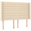 sengegavl med LED-lys 147x16x118/128 cm stof cremefarvet