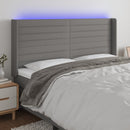 sengegavl med LED-lys 163x16x118/128 cm stof mørkegrå