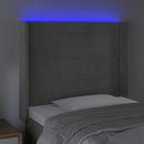 sengegavl med LED-lys 83x16x118/128 cm fløjl lysegrå