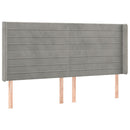 sengegavl med LED-lys 163x16x118/128 cm fløjl lysegrå