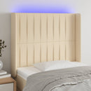 sengegavl med LED-lys 83x16x118/128 cm stof cremefarvet