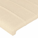 sengegavl med LED-lys 147x16x118/128 cm stof cremefarvet