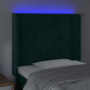 sengegavl med LED-lys 83x16x118/128 cm fløjl mørkegrøn