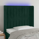 sengegavl med LED-lys 83x16x118/128 cm fløjl mørkegrøn