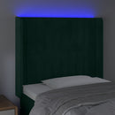 sengegavl med LED-lys 103x16x118/128 cm fløjl mørkegrøn