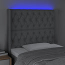 sengegavl med LED-lys 103x16x118/128 cm stof lysegrå