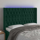 sengegavl med LED-lys 163x16x118/128 cm fløjl mørkegrøn
