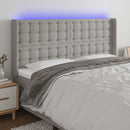 sengegavl med LED-lys 163x16x118/128 cm stof lysegrå