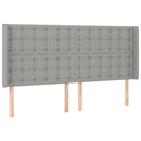 sengegavl med LED-lys 183x16x118/128 cm stof lysegrå
