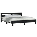 sengeramme med sengegavl og LED-lys 180x200 cm sort