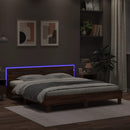 sengeramme med sengegavl og LED-lys 180x200 cm brunt egetræ