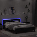 sengeramme med sengegavl og LED-lys 140x200 cm sort