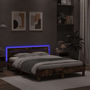 sengeramme med sengegavl og LED-lys 140x190 cm brunt egetræ