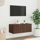 væghængt tv-bord med LED-lys 80x35x31 cm brun egetræsfarve