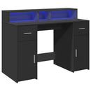 skrivebord med LED-lys 120x55x91 cm konstrueret træ sort