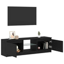 tv-bord med LED-lys 120x30x36 cm konstrueret træ sort egetræ