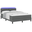 Box spring seng med LED-lysstrimler Mørkegrå 140 x 190 cm Stof