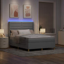 Box spring seng med LED-lysstrimler Lysegrå 140 x 190 cm Stof